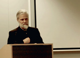Dr Christopher Melchert of Oxford at lectern IIS 2011.