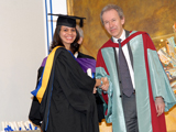 Professor Richard Andrews presenting certificate to graduate Amy Bhanji IIS,2014.